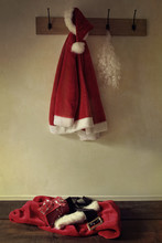 Santa Costume Hanging On Coat Rack