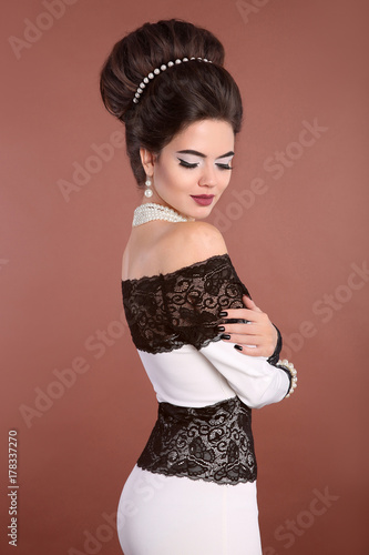 Elegant Brunette Sexy Woman In Fashionable Black White Dress