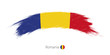 Flag of Romania in rounded grunge brush stroke.