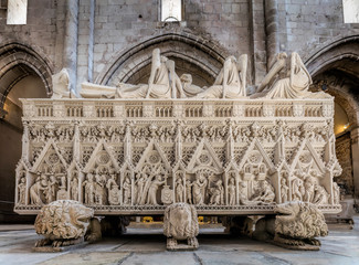 Sticker - Medieval tomb of King Pedro I of Portugal, decorated with reliefs showing scenes from Saint Bartholomew's life, located in the 13th century Alcobaca Monastery