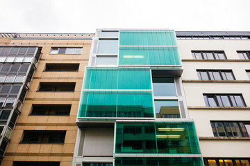 Wall Mural - low angle view of modern apartment complex in a street at berlin, germany