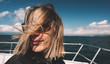 © Laszlo - Woman on boat deck in windy weather, wind blow her hair.