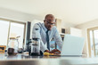 © Jacob Lund - Businessman working at home