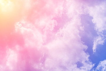 Wall Mural - sun and cloud background with a pastel colored

