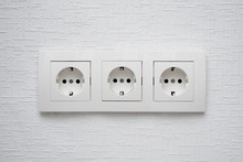 Electrical Sockets On A Wall