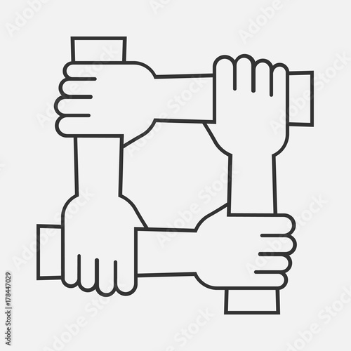 Four hands hold together for the wrist other. Four connected hands