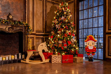 Christmas Decoration In Grunge Room Interior With Fireplace, Horse Rocking Kids Chair, Classic New Year Tree With Presents
