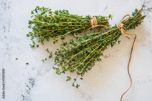 Fotografía Thyme on a white background. A bunch of fresh thyme