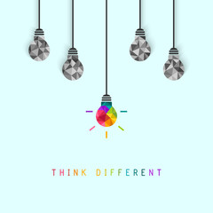 think different concept with creative and colorful lightbulb being more unique than the surrounding 