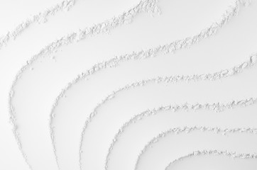White abstract soft smooth striped plaster background with curved waves.