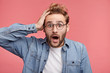 © WHstudio Leushin N - Excited unshaven man looks with widely opened mouth, keeps hand on head, realizes that he has deadline for making project, has no time. Styish male student hears unexpected news from groupmate