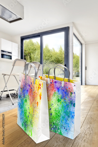 Fotografia Modern apartment interior with two shopping bags with Pollock style