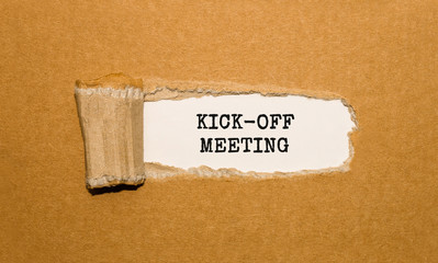 Wall Mural - The text KICK-OFF MEETING appearing behind torn brown paper