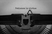 Text Patience Is Virtue Typed On Retro Typewriter