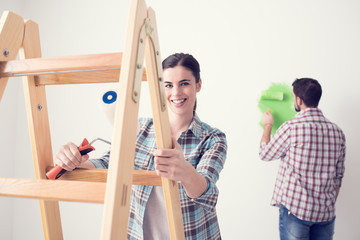 Wall Mural - Young couple renovating their house