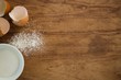 Overhead view of sugar by eggshells
