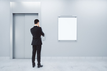 Wall Mural - man with poster and elevator