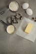 © WavebreakMediaMicro - High angle view of butter on wax paper by ingredients