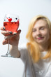 Girl drinking rose wine from a glass
