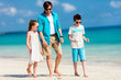 © BlueOrange Studio - Father with kids at beach