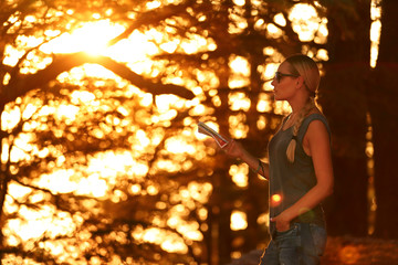 Fototapete - Traveler woman in the forest