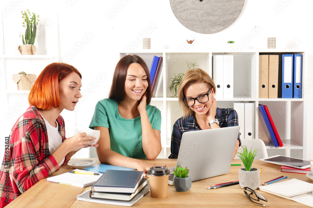 Group of young students studying indoors