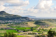 Castellabate, Italy - scenic view of the green hills, lands, sky and clouds