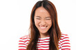 © Drobot Dean - Close up portrait of a pretty young asian girl laughing