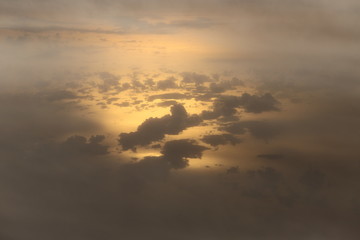 Wall Mural - Sunset White Cloud sky at high level attitude, view from window airplane