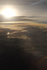 Wall Mural - Sunset White Cloud sky at high level attitude, view from window airplane