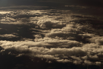 Wall Mural - Sunset White Cloud sky at high level attitude, view from window airplane