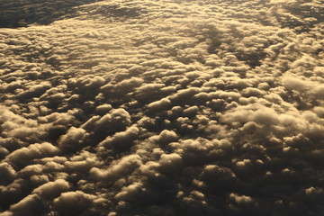 Wall Mural - Sunset White Cloud sky at high level attitude, view from window airplane