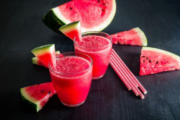 Watermelon drink in glasses with slices of watermelon