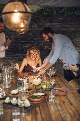 Wall Mural - Smiling Woman Having Birthday Party