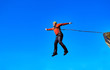 © Bondariev Volodymyr. - Jump off the cliff with a rope.