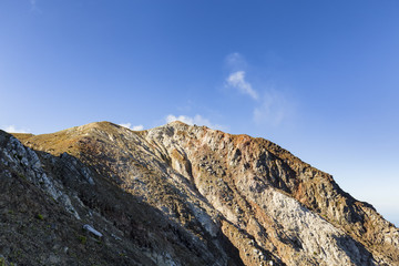 Small amount of sulphuric gasses near while hiking to the summit of Mount Egon in Indonesia.