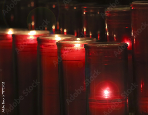 Fotografie, Obraz An Arrangement of Prayer Candles in a Church