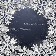 Wall Mural - Christmas and new year dark blue background with christmas ronnd frame made of silver glittering snowflakes on dark background. Merry Christmas greeting card