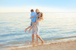 © Africa Studio - Happy family on sea beach at resort
