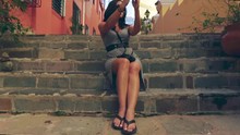 Woman Taking Selfie/texting On Vacation In Old San Juan - Also Looks Like Cuba