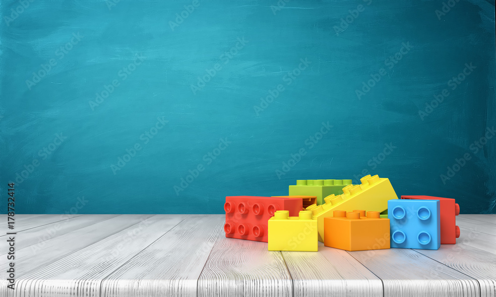 3d rendering of a toy building blocks lying in a colorful pile over a ...