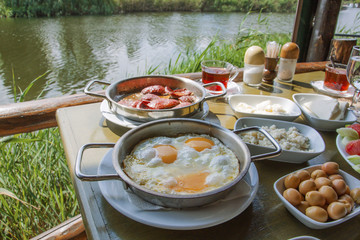 Wall Mural - Eggs and sausage breakfast