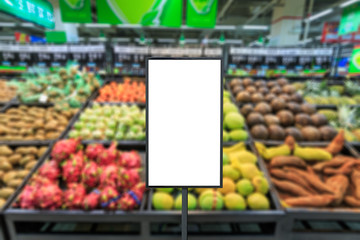 Blank billboard and blurred supermarket fruits background