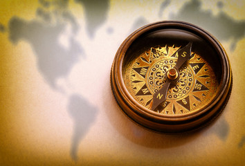 Wall Mural - Compass on map background