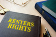 Book with title renters rights and keys.