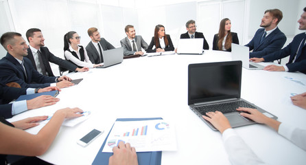 Poster - meeting of shareholders of the company at the round - table.