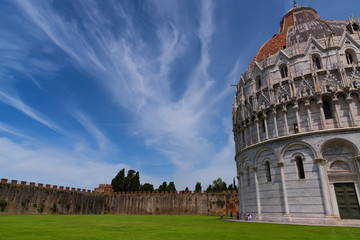 Wall Mural - Magnificent daily view at the Pisa Baptistery of St. John, the largest baptistery in Italy, in the Square of Miracles (Piazza dei Miracoli), Pisa, Italy.