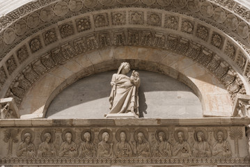 Wall Mural - Details of the exterior of the Pisa Baptistery of St. John, the largest baptistery in Italy, in the Square of Miracles (Piazza dei Miracoli), Pisa, Italy.