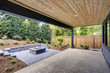 © Iriana Shiyan - New modern home features a backyard with patio