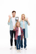 © Drobot Dean - Full length portrait of a beautiful smiling family